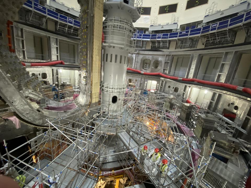 Work takes place on the partially assembled ITER tokamak on August 3, 2022. / Credit: Haley Ott