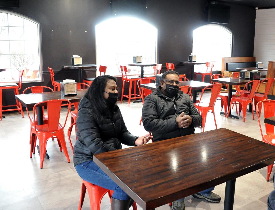 The Curry Pot co-owners Tania Bayer and Renoy Barua in the dining area of their new downtown Wooster restaurant.