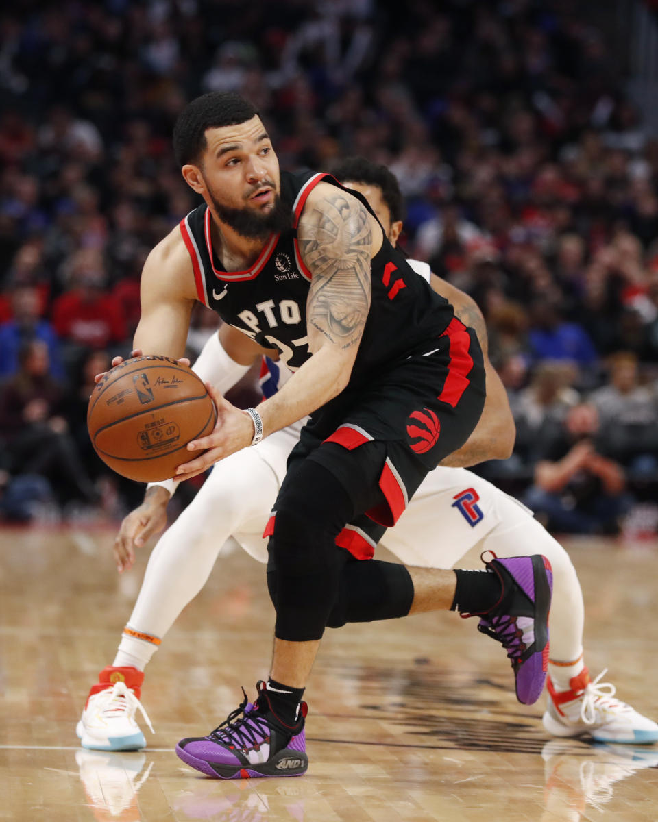 Toronto Raptors guard Fred VanVleet (23) steals the ball from Detroit Pistons guard Derrick Rose during the second half of an NBA basketball game Friday, Jan. 31, 2020, in Detroit. (AP Photo/Carlos Osorio)