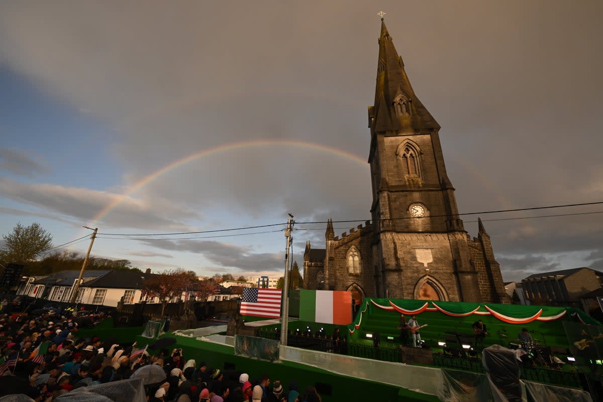 A rainbow is seen over St Muredach's Cathedral prior to the arrival of the president Joe Biden to a celebration event in Ballina (Getty Images)