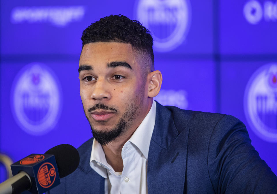 New Edmonton Oilers NHL hockey player Evander Kane speaks during a press conference in Edmonton, Alberta, Friday, Jan. 28, 2022. (Jason Franson/The Canadian Press via AP)