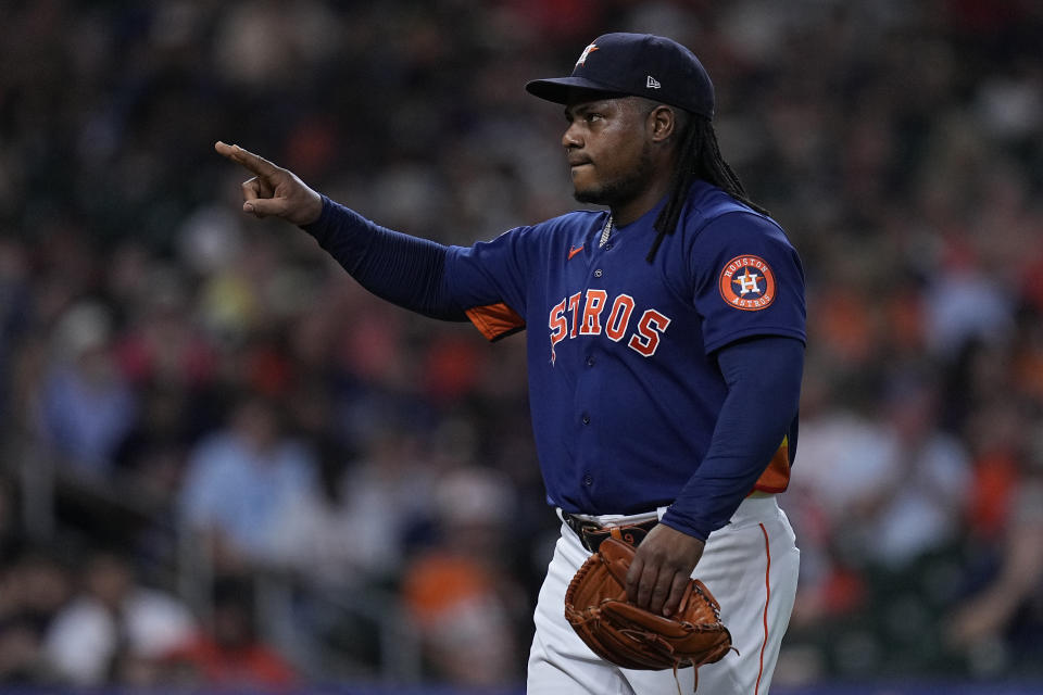 Houston Astros starting pitcher Framber Valdez points into the stands in the middle of the fourth inning of a baseball game against the Cleveland Guardians, Tuesday, Aug. 1, 2023, in Houston. (AP Photo/Kevin M. Cox)