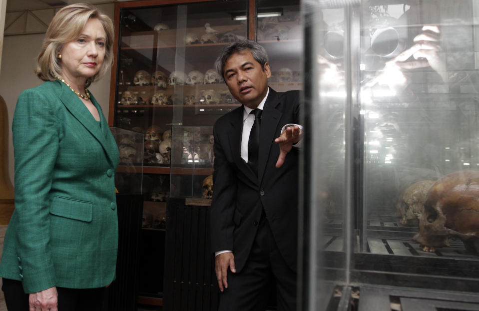 Then-Secretary of State Hillary Clinton with to Youk Chhang, the director of the Documentation Center of Cambodia, during a visit to notorious Khmer Rouge security prison Tuol Sleng (S-21) in Phnom Penh, Cambodia on Nov. 1, 2010.