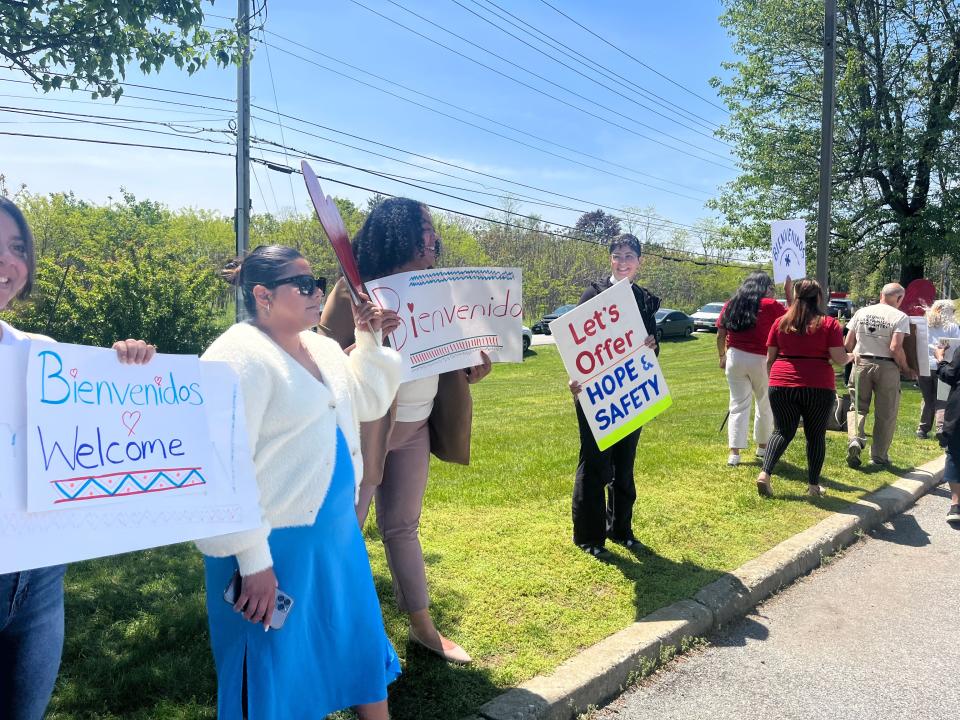 Members of grassroots organization For the Many and local elected officials greeted two buses of asylum seekers at Newburgh’s Crossroads Hotel on May 11, 2023. They were joined by other organizers, including those from the Workers Justice Center of New York and the New York Civil Liberties Union.