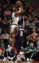 BOSTON, MA - MAY 10: Ray Allen #20 of the Boston Celtics shoots a three point shot as Joe Johnson #2 of the Atlanta Hawks defends in Game Six of the Western Conference Quarterfinals in the 2012 NBA Playoffs on May 10, 2012 at TD Garden in Boston, Massachusetts. The Boston Celtics defeated the Atlanta Hawks 83-80. NOTE TO USER: User expressly acknowledges and agrees that, by downloading and or using this photograph, User is consenting to the terms and conditions of the Getty Images License Agreement. (Photo by Elsa/Getty Images)