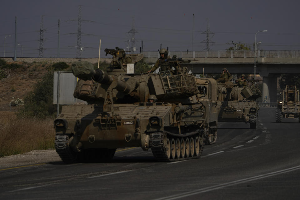 Israeli army tanks move towards the Gaza Strip border in southern Israel Wednesday, Nov.1, 2023. Israeli ground forces have been operating in Gaza in recent days as Israel presses ahead with its war against Hamas militants. (AP Photo/Ariel Schalit)