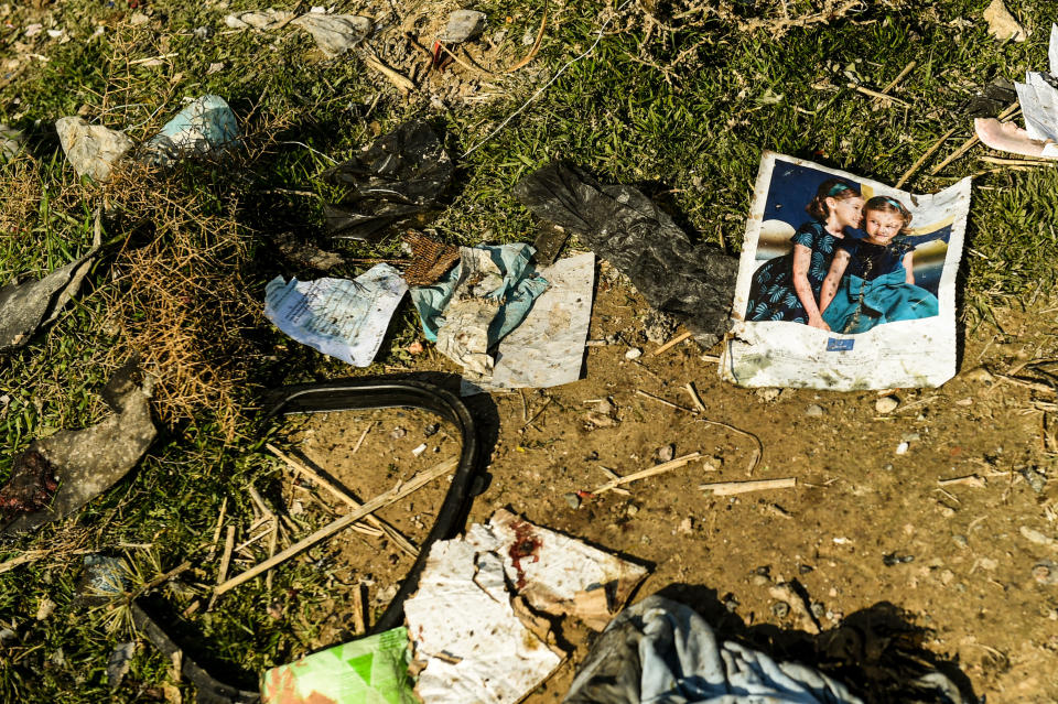 A page from a magazine lies amongst the wreckage from a Boeing Co. 737-800 aircraft, operated by Ukraine International Airlines, which crashed shortly after takeoff near Shahedshahr, Iran, on Wednesday, Jan. 8, 2020.  (Photo: Ali Mohammadi/Bloomberg via Getty Images)