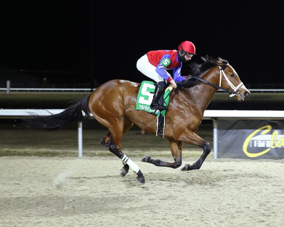 Epic Ride and jockey Adam Beschizza, racing here at Turfway Park, are hopeful to make it into the Kentucky Derby on May 4 at Churchill Downs.