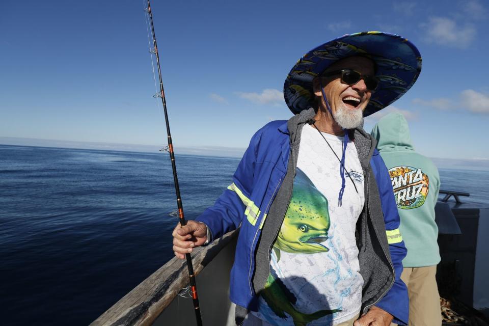 Kurt Dahlin of Redondo Beach wears a shirt he purchased in Costa Rica depicting a dorado.