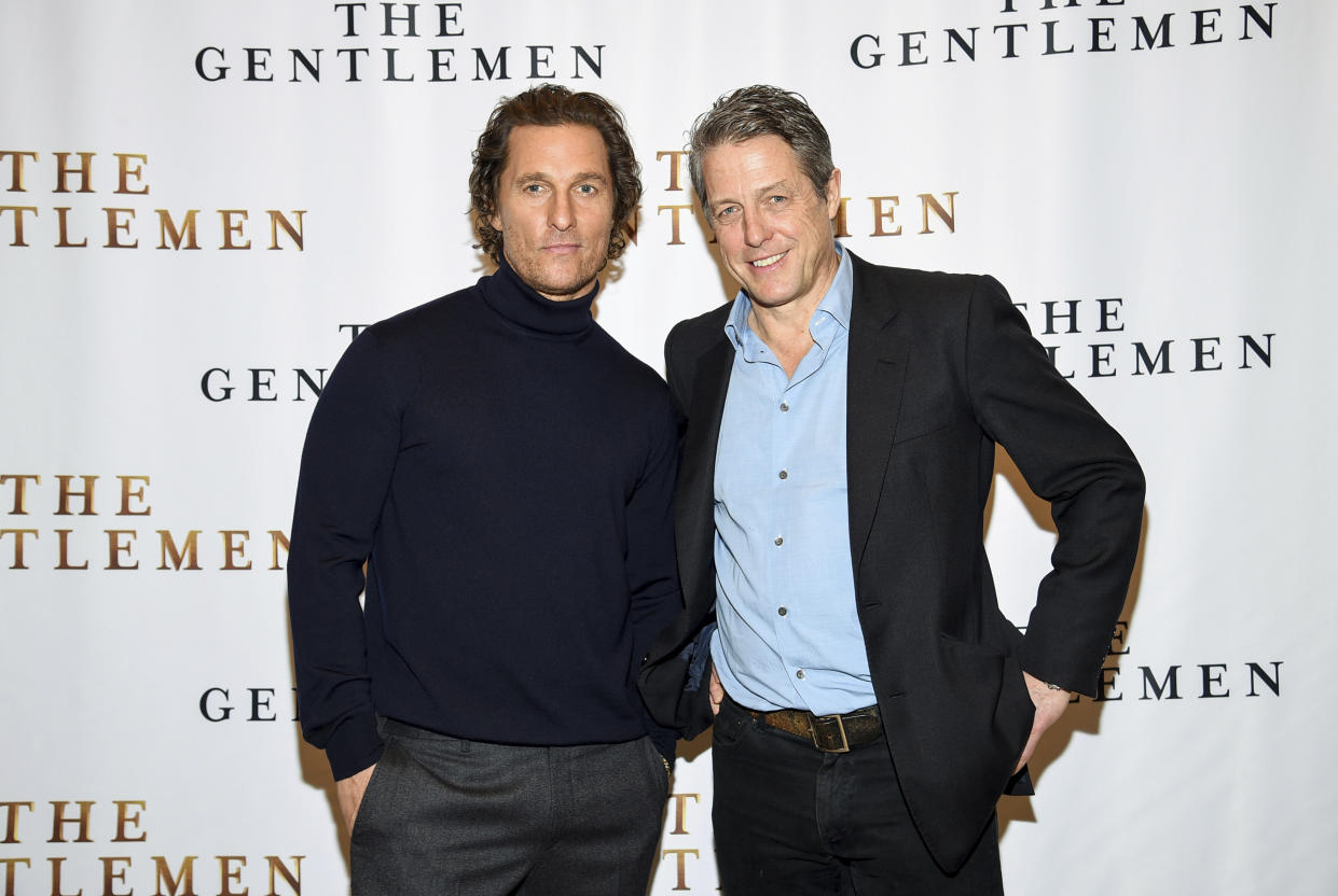 Actors Matthew McConaughey, left, and Hugh Grant pose together during photo call for the film "The Gentlemen" at The Whitby Hotel on Saturday, Jan. 11, 2020, in New York. (Photo by Evan Agostini/Invision/AP)