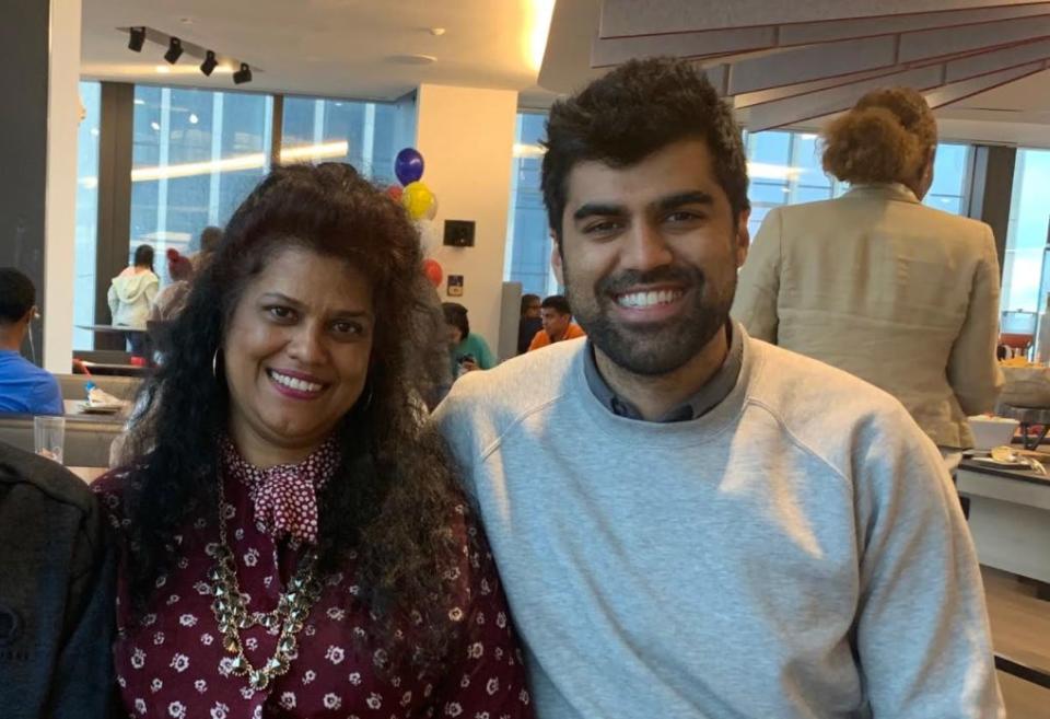 The author with his mom at a family day at the law firm where he worked in New York City in 2019.  (Photo: Courtesy of Ravi Guru Singh)