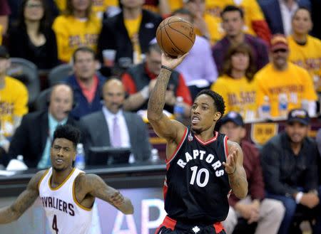 May 17, 2016; Cleveland, OH, USA; Toronto Raptors guard DeMar DeRozan (10) shoots in the third quarter against the Cleveland Cavaliers in game one of the Eastern conference finals of the NBA Playoffs at Quicken Loans Arena. Mandatory Credit: David Richard-USA TODAY Sports