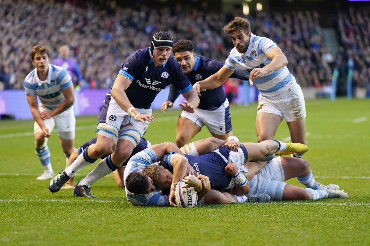 Darcy Graham (centre-bottom) scored Scotland’s third try (Jane Barlow/PA) (PA Wire)