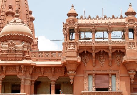 An Egyptian worker is seen during the restoration work inside the Baron Empain Palace, in the Cairo's suburb Heliopolis