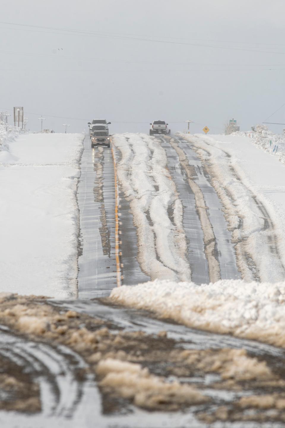 Highway 138 was closed at Beekly Road in Phelan CA on Saturday February 25, 2023. Some parts received a foot of snow in Saturday’s storm. (James Quigg, for the Daily Press)