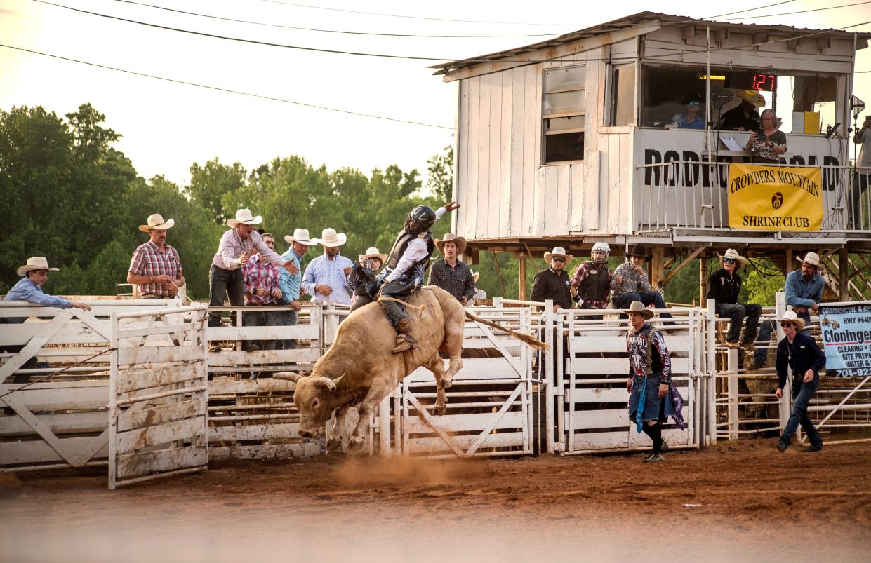 Competitors enter Price's Arena at a recent rodeo.