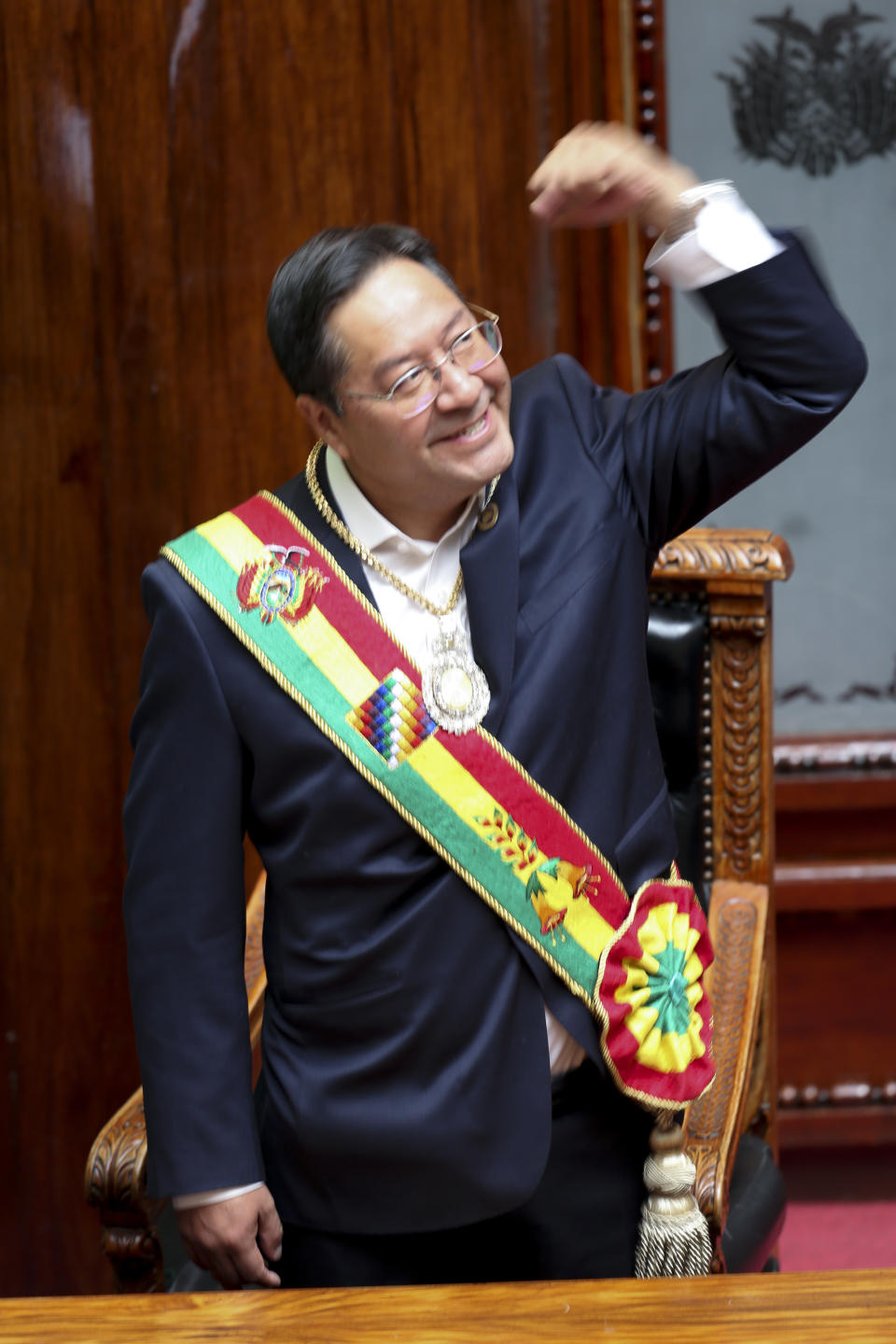 Bolivia's new President Luis Arce smiles at the Congress on his inauguration day in La Paz, Bolivia, Sunday, Nov. 8, 2020. (AP Photo/Jorge Mamani)