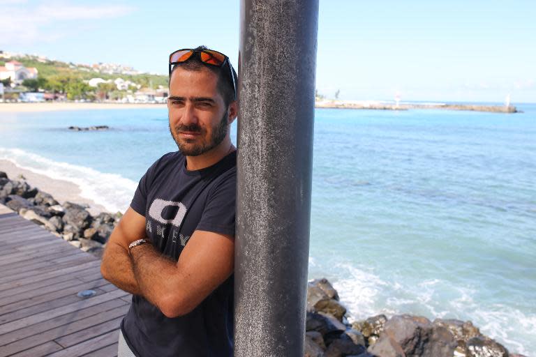 Hugo Savalli, former French surfing champion, pictured in Saint-Gilles, on the western coast of the French Indian Ocean island of Reunion