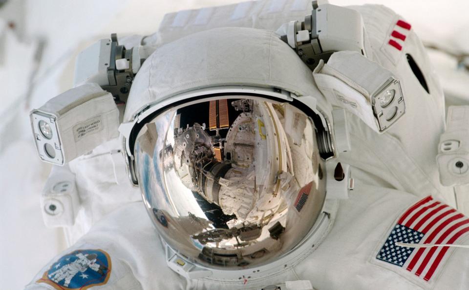 Close views of Paul Richards during an Extravehicular Activity (EVA) on the International Space Station (ISS). View STS102-346-021 is a crew pick selection.  