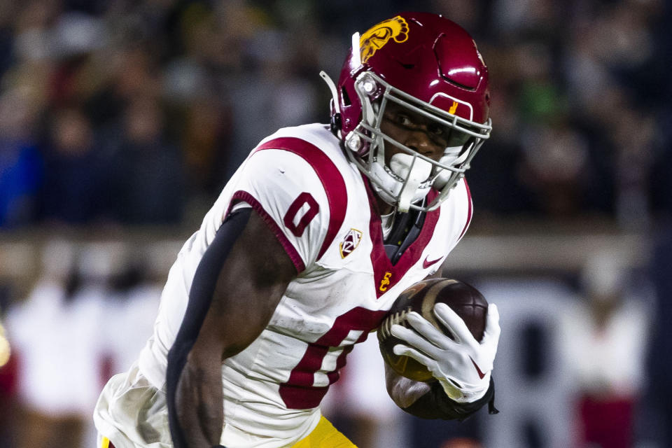 Southern California running back MarShawn Lloyd (0) runs the ball during the first half of an NCAA college football game against Notre Dame, Oct. 14, 2023, in South Bend, Ind. (AP Photo/Michael Caterina)