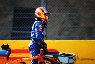 SCARPERIA, ITALY - SEPTEMBER 13: Carlos Sainz of Spain and McLaren F1 climbs out of his car after a collision during the F1 Grand Prix of Tuscany at Mugello Circuit on September 13, 2020 in Scarperia, Italy. (Photo by Peter Fox/Getty Images)