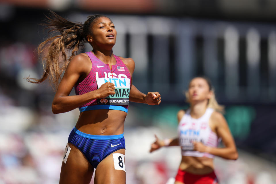 Gabrielle Thomas, of the United States crosses the line after racing in a Women's 200-meters heat during the World Athletics Championships in Budapest, Hungary, Wednesday, Aug. 23, 2023. (AP Photo/Petr David Josek)