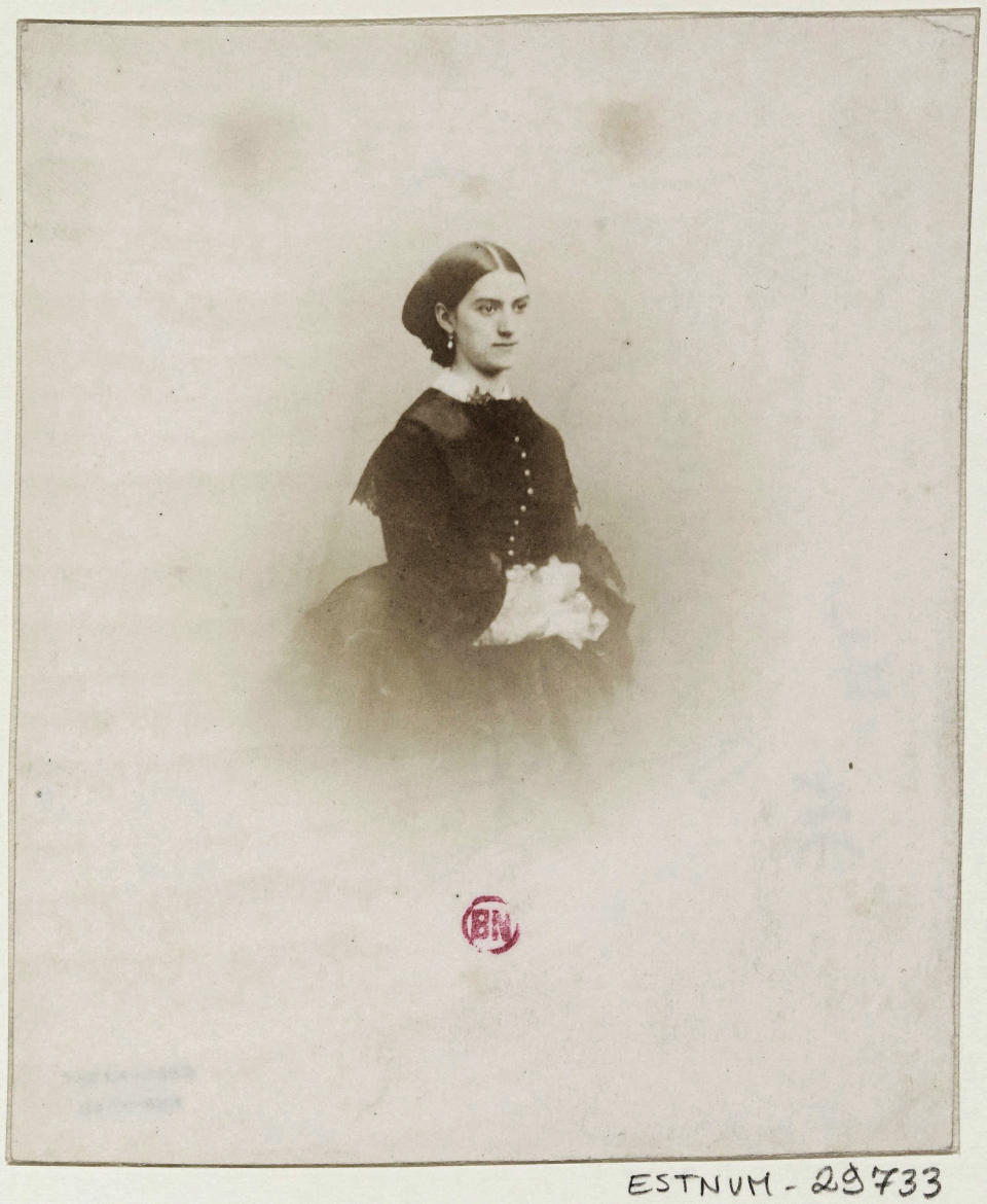 CORRECTS YEAR TO 1866, NOT 1966-This undated photo taken by Nadar and provided by the BNF (Bibilotheque Nationale de France) shows opera dancer Constance Queniaux. She was a courtesan living from subsidies provided by rich men - but preferring the company of women - and ended her life as a very honorable patroness helping orphans. Mademoiselle Constance Queniaux was 34 in 1866 when the French master Gustave Courbet painted her in L’Origine du monde (The Origin of the World), a realistic close up of a woman's naked torso, legs spread and face hidden by a rumpled sheet. French literature expert Claude Schopp found by chance the mention of her name in a letter by French writer Alexandre Dumas fils, the son of The Three Musketeers’ author. (Nadar/BNF via AP)