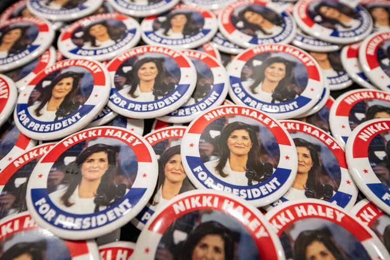 Buttons are seen on a table before US Republican presidential hopeful and former UN Ambassador Nikki Haley speaks during a campaign rally in Portland, Maine, on March 3, 2024. (Photo by Joseph Prezioso / AFP)