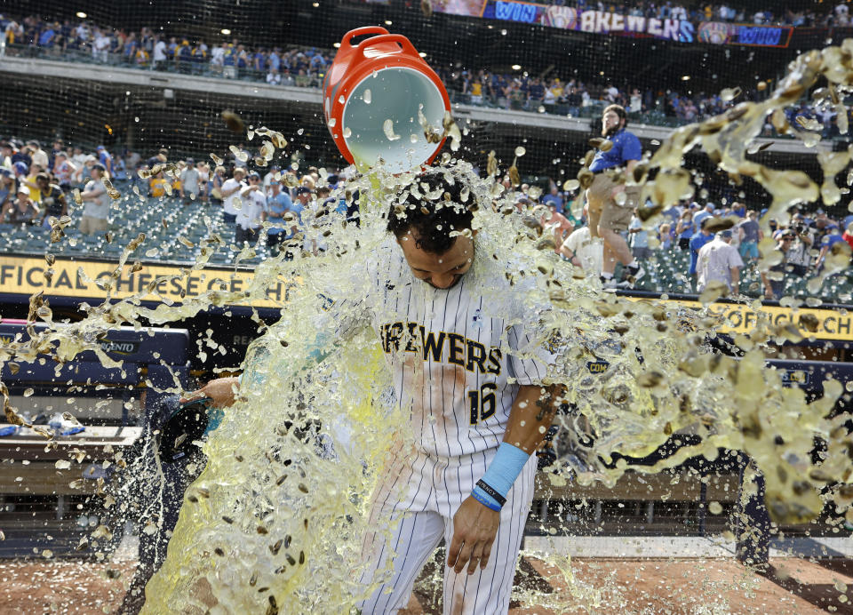 Milwaukee Brewers' Blake Perkins is doused with Gatorade after a baseball game against the Cincinnati Reds, Sunday, June 16, 2024, in Milwaukee. (AP Photo/Jeffrey Phelps)