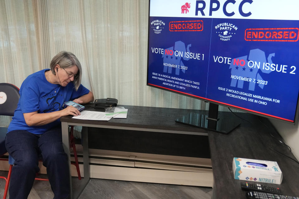 Doris Peters calls voters during a phone bank event Thursday, Sept. 28, 2023, at the Republican Party of Cuyahoga County in Independence, Ohio. (AP Photo/Sue Ogrocki)