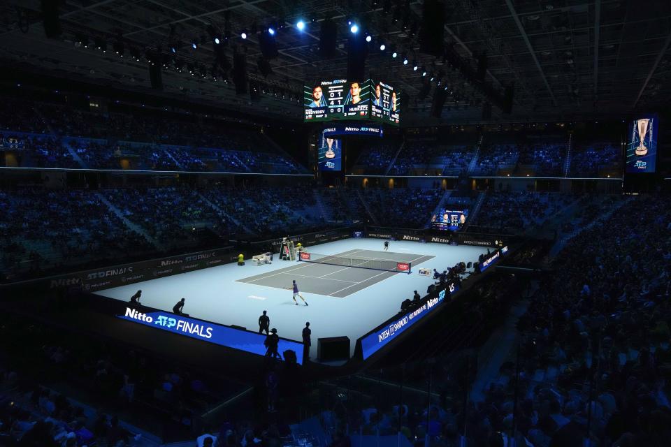 Danil Medvedev of Russia returns the ball to Hubert Hurkacz of Poland during their ATP World Tour Finals singles tennis match, at the Pala Alpitour in Turin, Sunday, Nov. 14, 2021. (AP Photo/Luca Bruno)