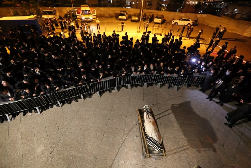 FILE PHOTO: The body of Menahem Kanovlowitz, who died in a stampede at an ultra-Orthodox Jewish festival on the slopes of Israel's Mount Meron, is seen during his funeral in Jerusalem