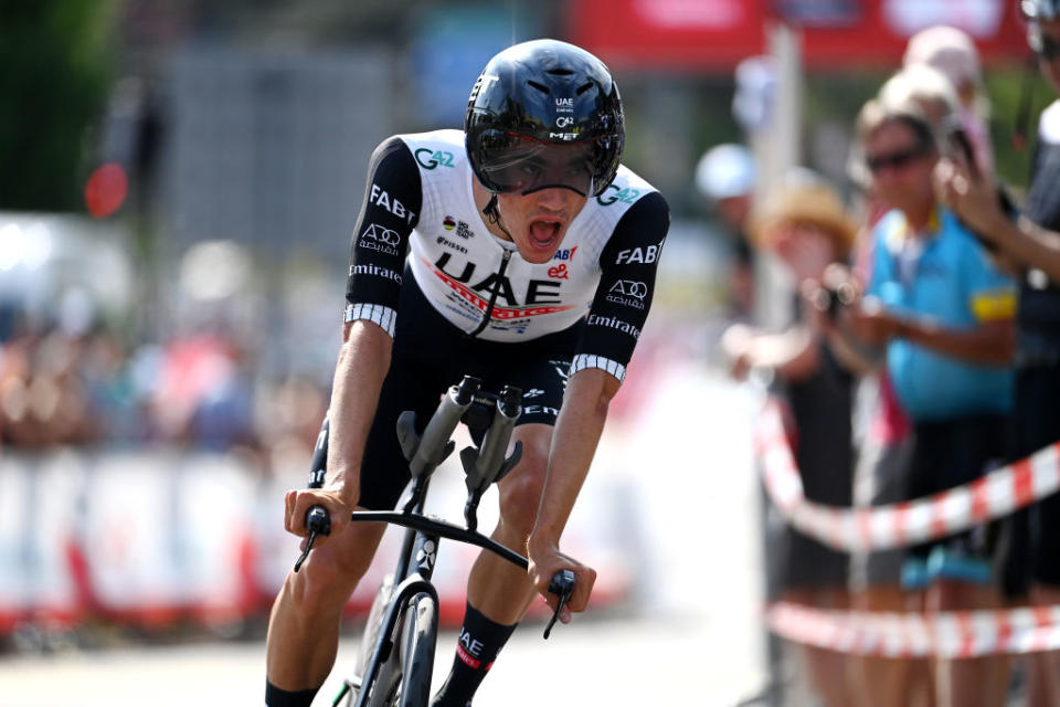 ABTWILL SWITZERLAND  JUNE 18 Juan Ayuso of Spain and UAE Team Emirates crosses the finish line during the 86th Tour de Suisse 2023 Stage 8 a 257km individual time trial from St Gallen to Abtwil  UCIWT  on June 18 2023 in Abtwil Switzerland Photo by Tim de WaeleGetty Images