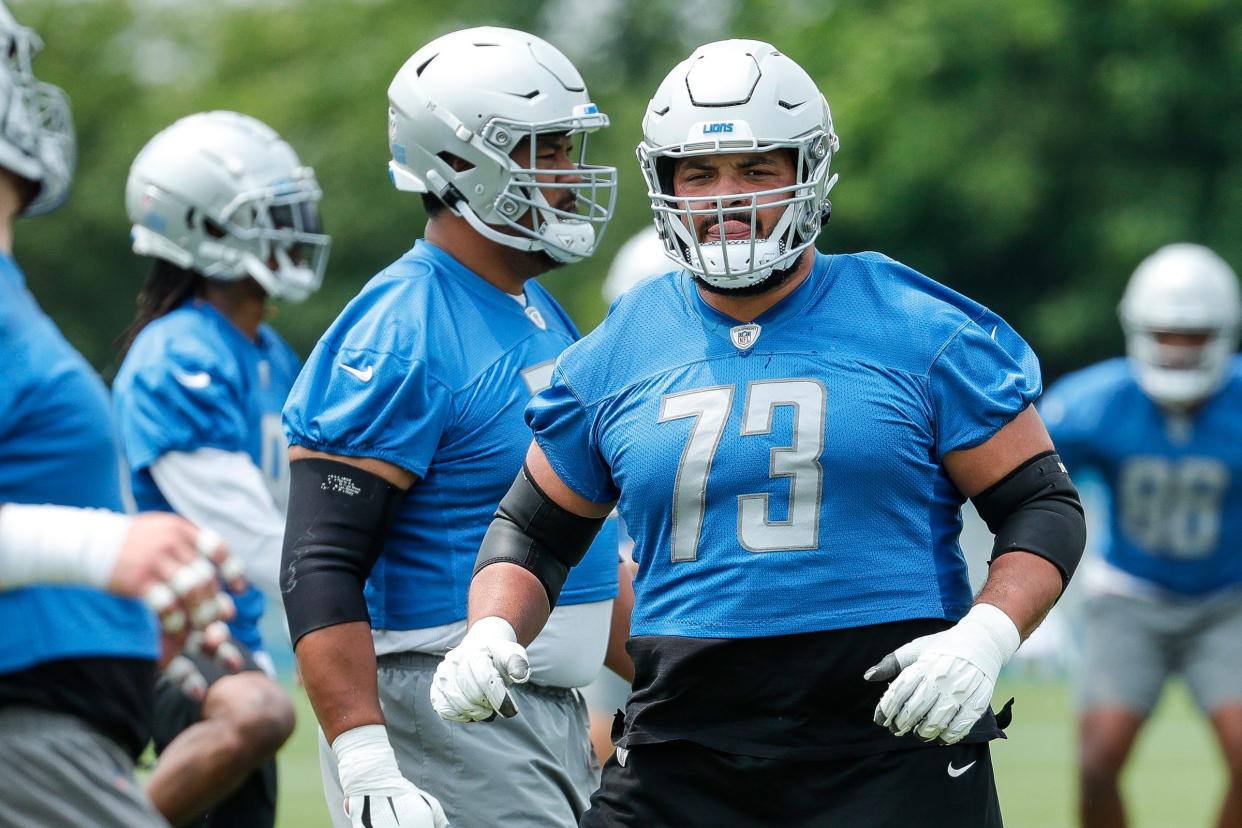 Detroit Lions guard Jonah Jackson (73) warms up during minicamp at Detroit Lions Headquarters and Training Facility in Allen Park on Tuesday, June 6, 2023.