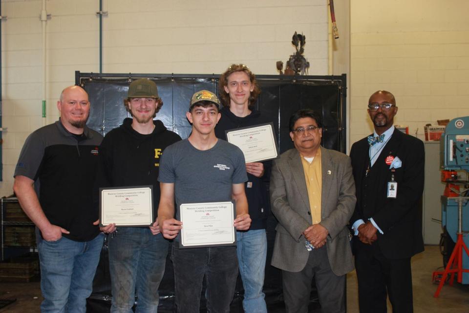 MCCC welding instructor Stephen Hasselbach (left) is shown with the winners of the Combined Process Welding skills competition category: Ryan Coshatt, Ben Pitu and Elliott Bell. Also shown are Parmeshwar Coomar, dean of the Applied Science and Engineering Technology Division, and Kojo Quartey, president of MCCC.