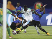 Senegal's Krepin Diatta, left, and Senegal's Idrissa Gana Gueye fight for the ball during the African Cup of Nations group C soccer match between Senegal and Tanzania at 30 June Stadium in Cairo, Egypt, Sunday, June 23, 2019. (AP Photo/Hassan Ammar)