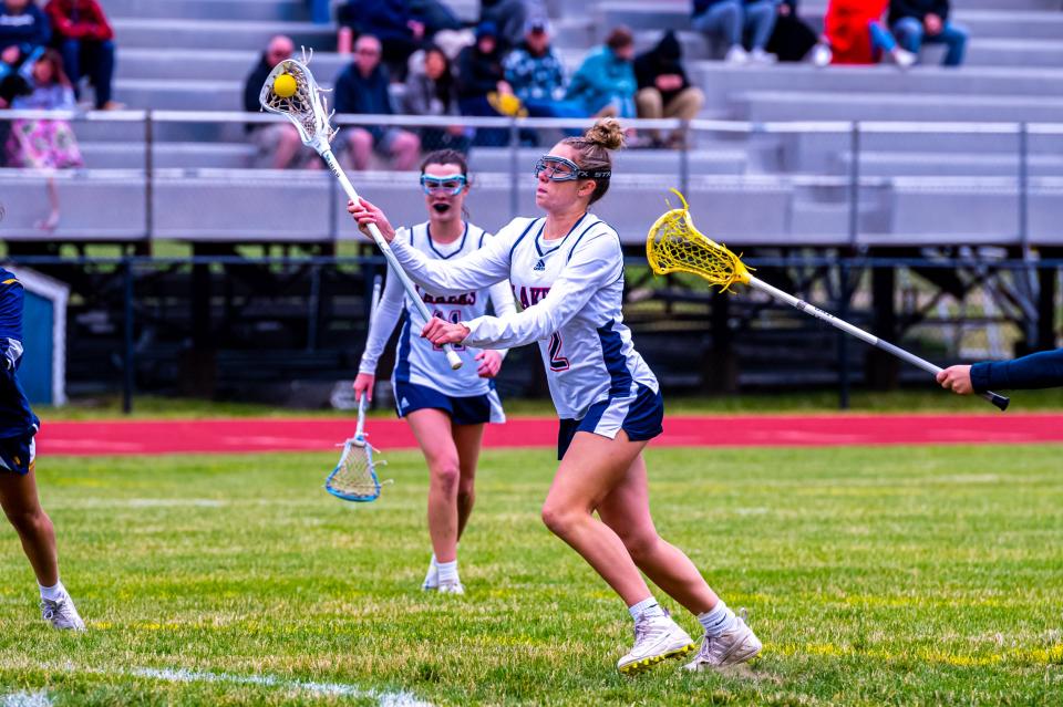 Apponequet's Hannah Procaccini fires on goal.