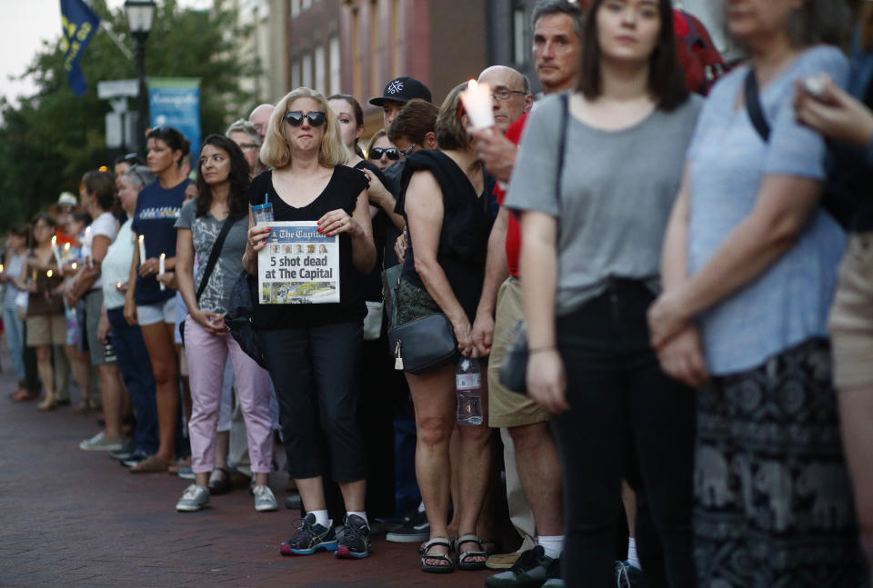 Mourners remember 5 people slain at the Capital Gazette in Annapolis, Md.