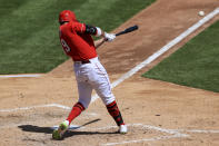 Cincinnati Reds' Joey Votto hits a two-run RBI double during the fifth inning of a baseball game against the Cleveland Indians in Cincinnati, Sunday, April 18, 2021. (AP Photo/Aaron Doster)