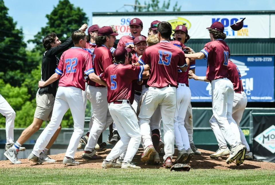 Spaulding baseball celebrates its first championship since 1990 after a 4-2 win over Lyndon at Centennial Field on June 11.