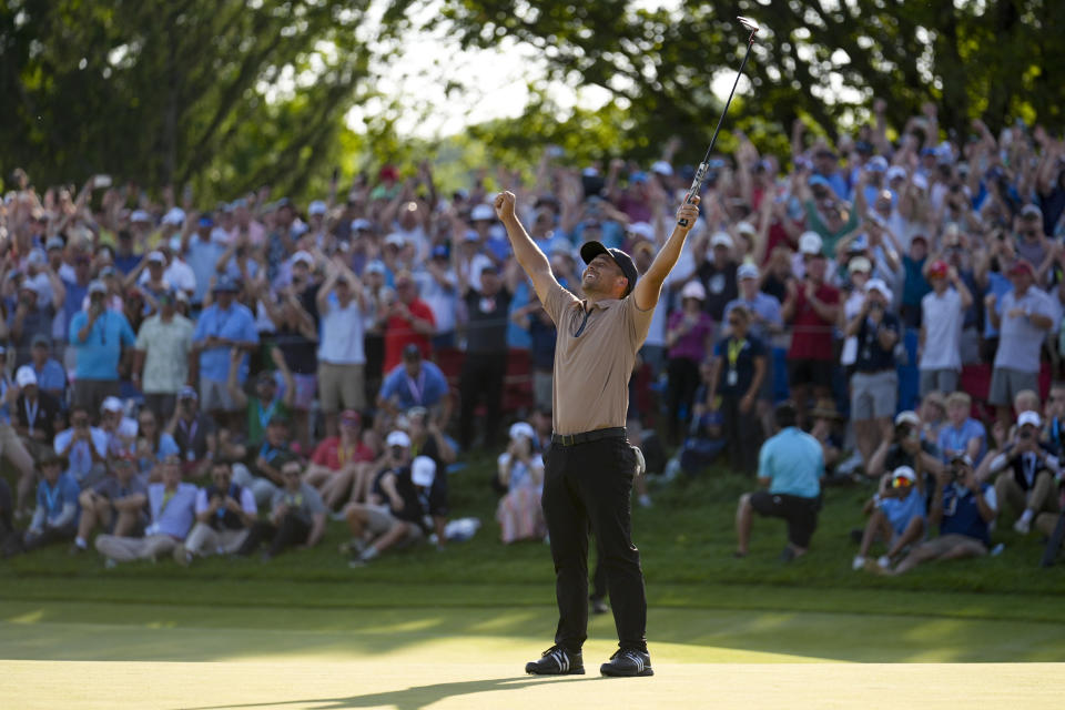 Xander Schauffele celebrates after winning the PGA Championship golf tournament at the Valhalla Golf Club, Sunday, May 19, 2024, in Louisville, Ky. (AP Photo/Jeff Roberson)