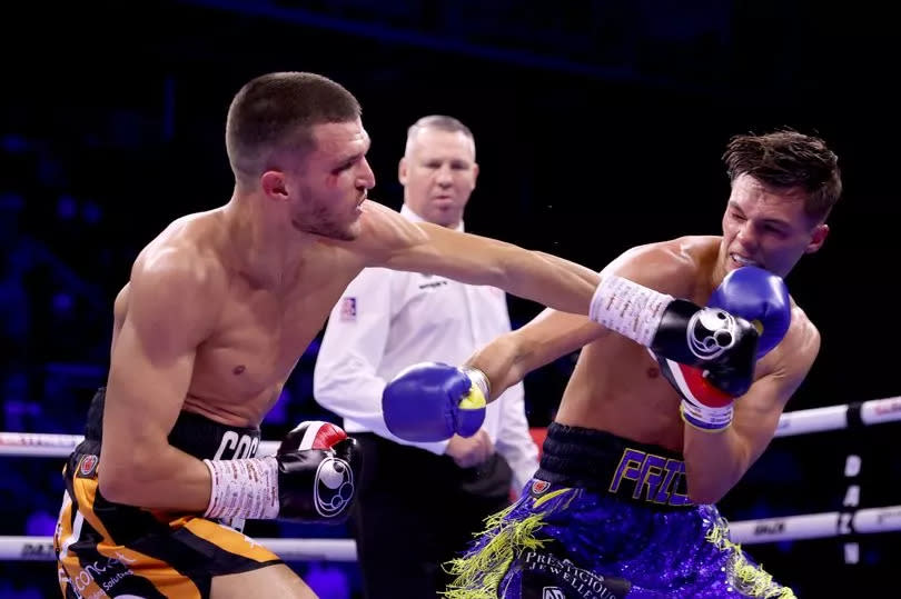 Connor Coghill punches Hopey Price during the Featherweight fight between Hopey Price and Connor Coghill at Utilita Arena Sheffield