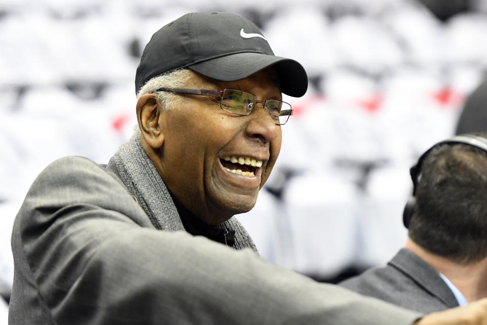 John thompson watches a Georgetown game. 