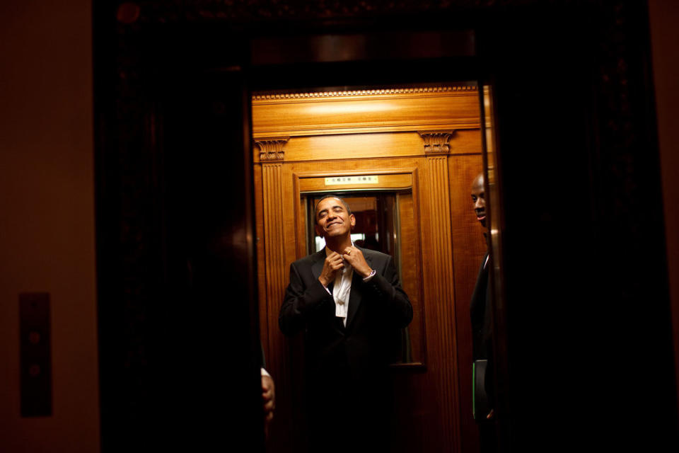 Obama rides the elevator to the private residence of the White House after attending 10 inaugural balls and being sworn in as president on Jan. 20, 2009.