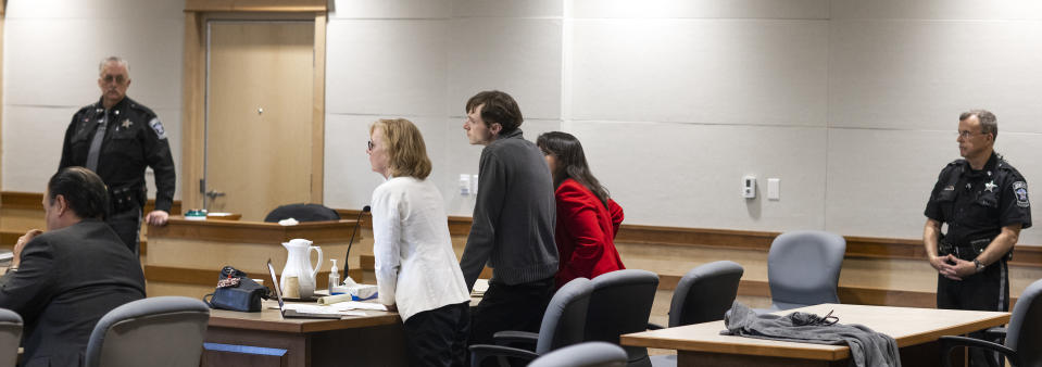 Logan Clegg, center, listens as a guilty verdict of second degree murder is announced on Monday, October 23, 2023, at Merrimack County Superior Court in Concord, N.H. After deliberating for a day and a half, a jury found Clegg guilty in the April 2022 killings of Stephen and Djeswende Reid. (Geoff Forester/The Concord Monitor via AP, Pool)