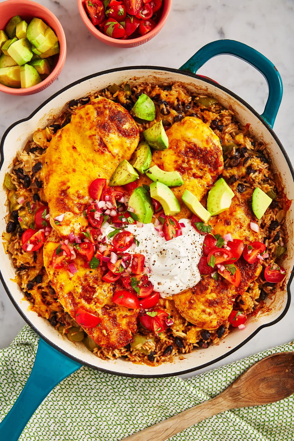 <p>Bowls in general are such a smart move, because they’re quick, easy, and insanely delicious. To make these burrito bowls, you take your basic burrito fillings—in this case taco-spiced chicken and black bean rice—and cook them in the same skillet. Everyone can serve themself and add as much (or little) of the toppings as they like. The result is a family-friendly dinner with <em>way </em>less dishes to wash after.</p><p>Get the <strong><a href="https://www.delish.com/cooking/recipe-ideas/a31275534/chicken-burrito-bowl-skillet-recipe/" rel="nofollow noopener" target="_blank" data-ylk="slk:Chicken Burrito Bowl Skillet recipe;elm:context_link;itc:0;sec:content-canvas" class="link ">Chicken Burrito Bowl Skillet recipe</a></strong>. </p>