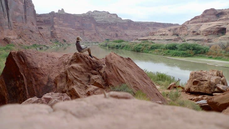 The author pondering her marriage on the Green River, Utah