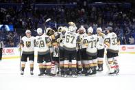 Feb 5, 2019; Tampa, FL, USA; Vegas Golden Knights celebrate as they beat the Tampa Bay Lightning in a shootout at Amalie Arena. Mandatory Credit: Kim Klement-USA TODAY Sports