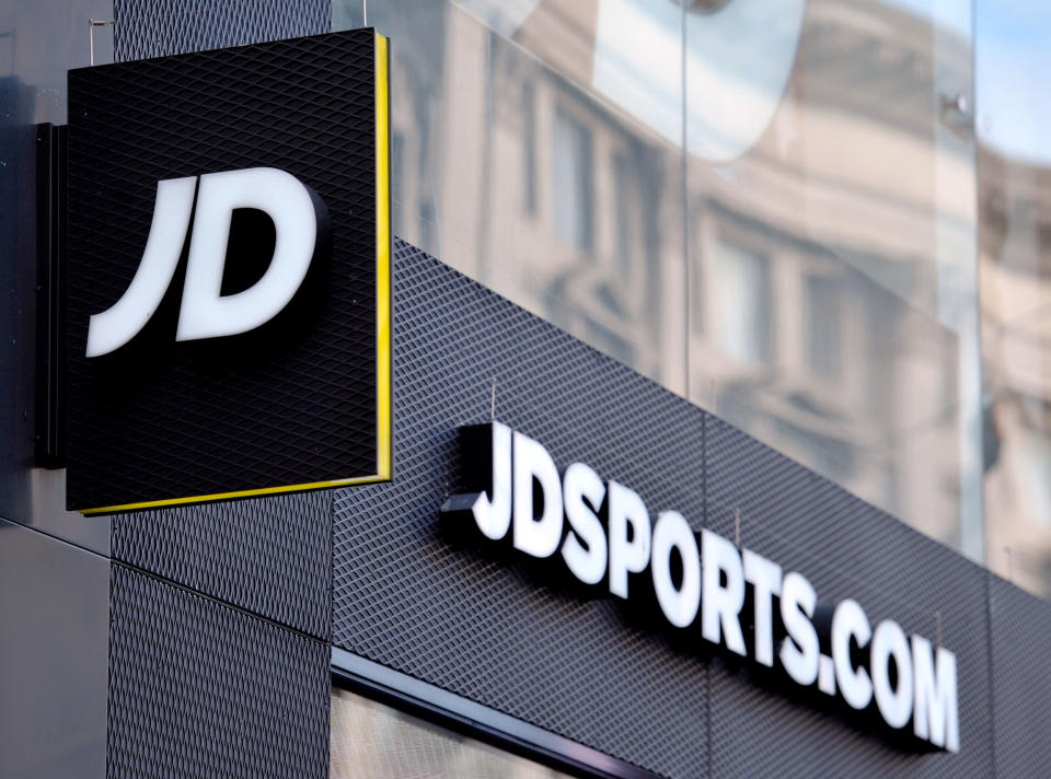 File photo dated 06/01/16 of a shop sign for JD Sports in central London. The chain has warned that retail footfall remains "weak" as cost rises caused by higher online sales weighed down on half-year profits.
