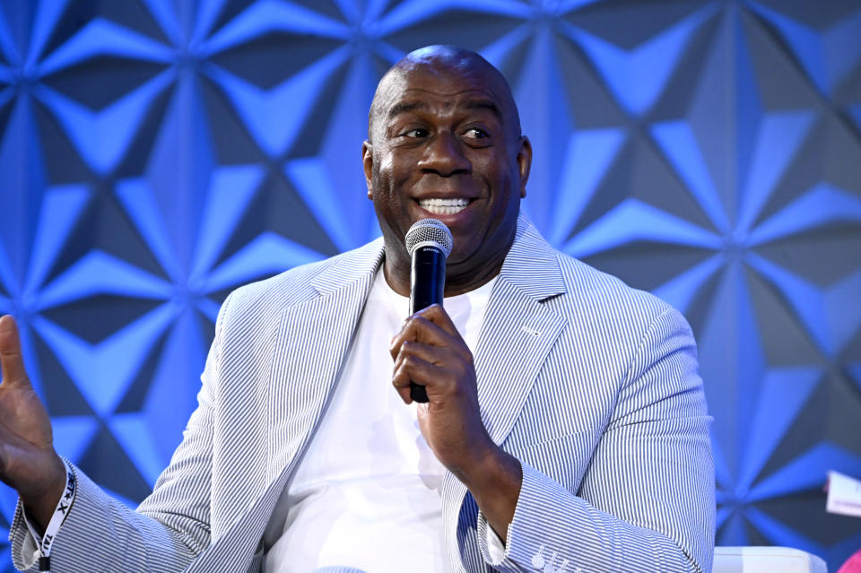 LOS ANGELES, CALIFORNIA - JUNE 22: Magic Johnson speaks onstage during The Genius of Magic Johnson Sponsored by Denny’s at The Genius Talks Sponsored By Credit Karma during the BET Experience at the Los Angeles Convention Center on June 22, 2019 in Los Angeles, California. (Photo by Frazer Harrison/Getty Images for BET)